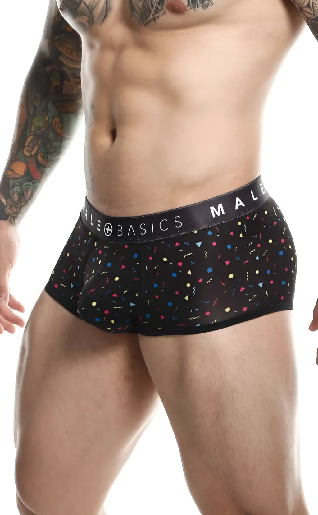 Black men’s briefs with colorful confetti pattern and Malebasics brand name on the waistband in Malebasics trunk sexy pouch