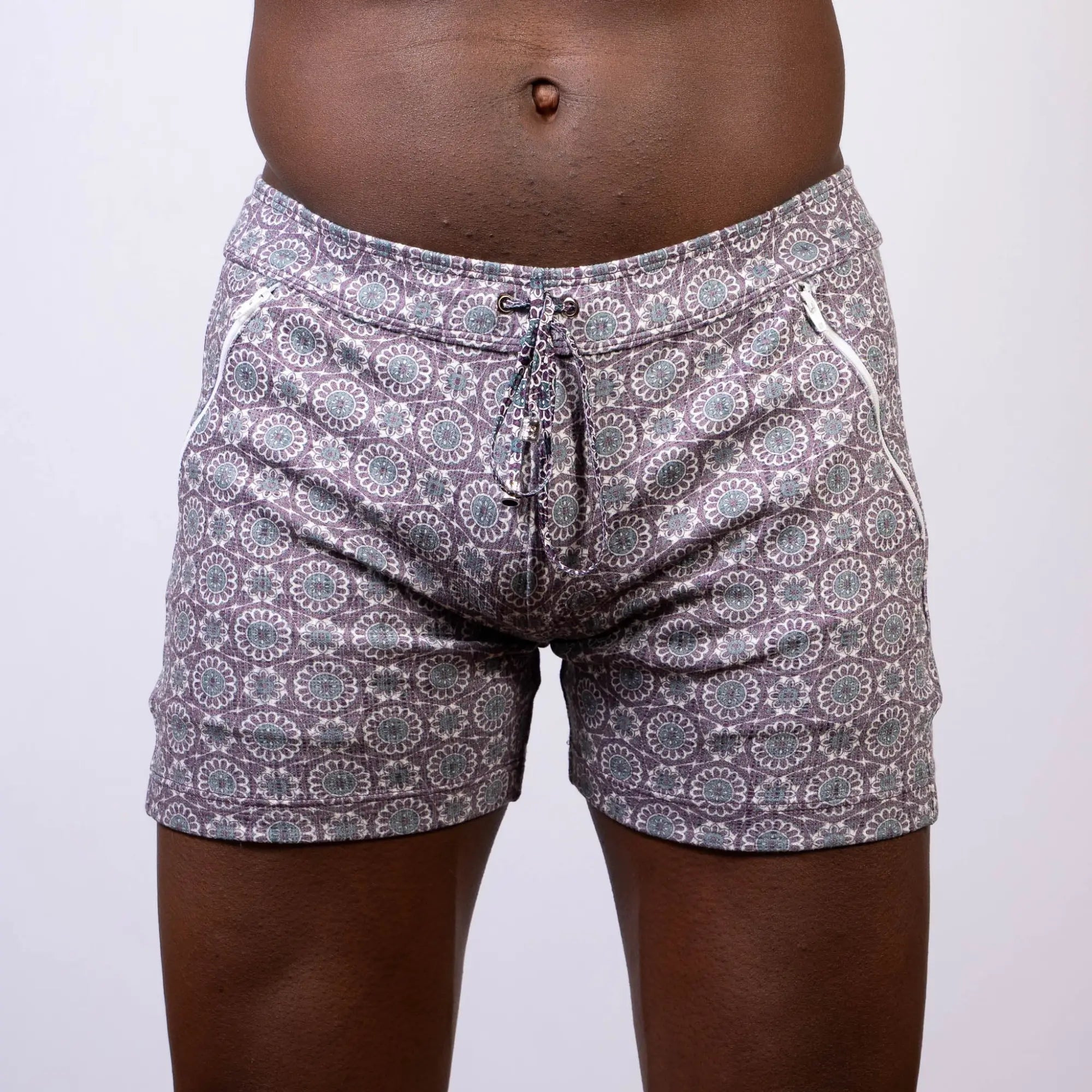 Mandala linen texture shorts in gray and white with circular floral design and side zipper pockets