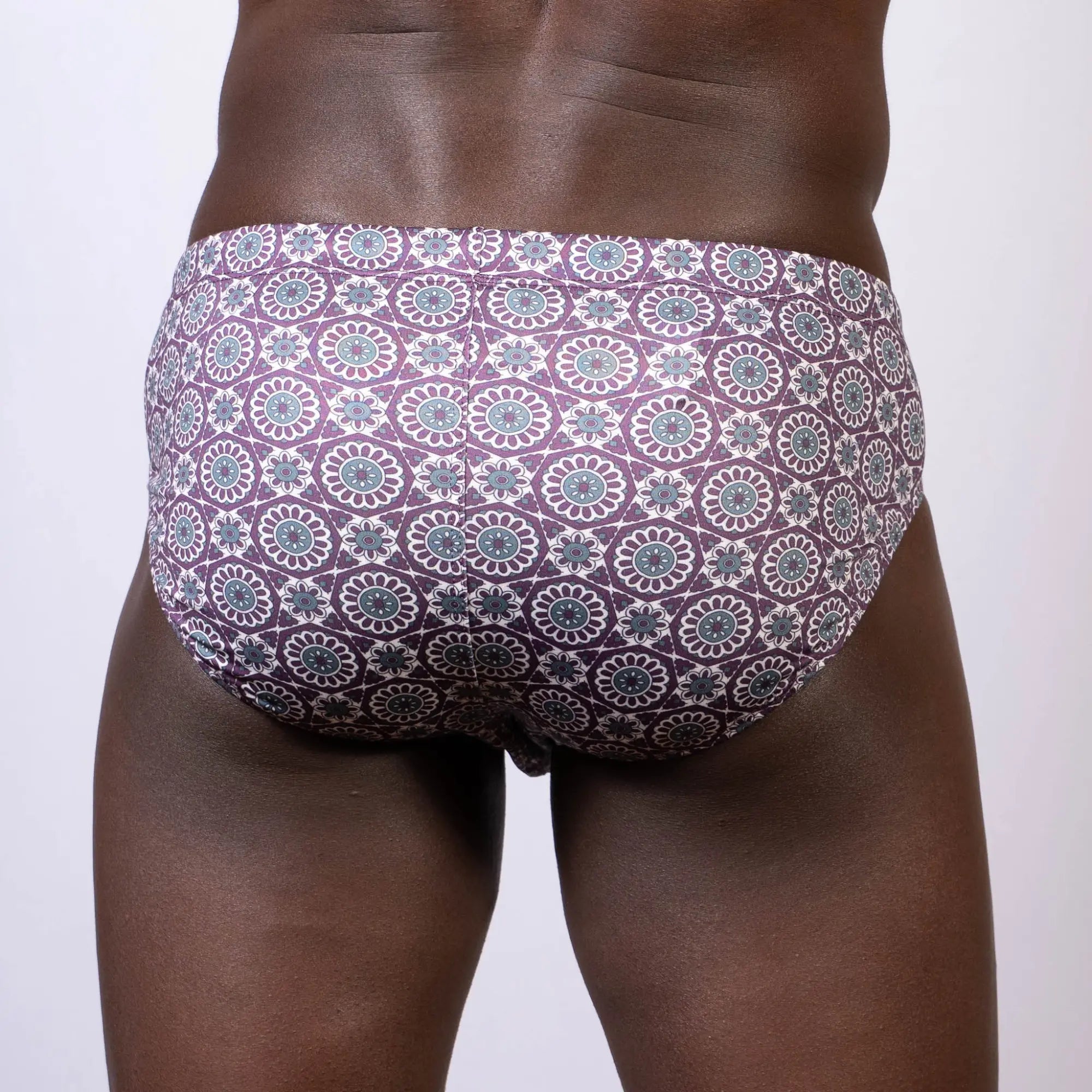 Mandala swim brief purple and teal geometric floral patterned briefs front view with comfortable fit