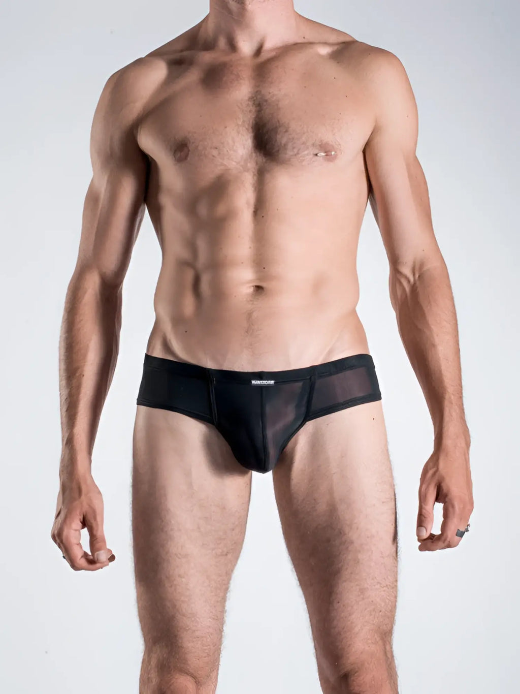 Black mesh manstore M101 cheeky brief underwear with a solid black waistband in size S front view