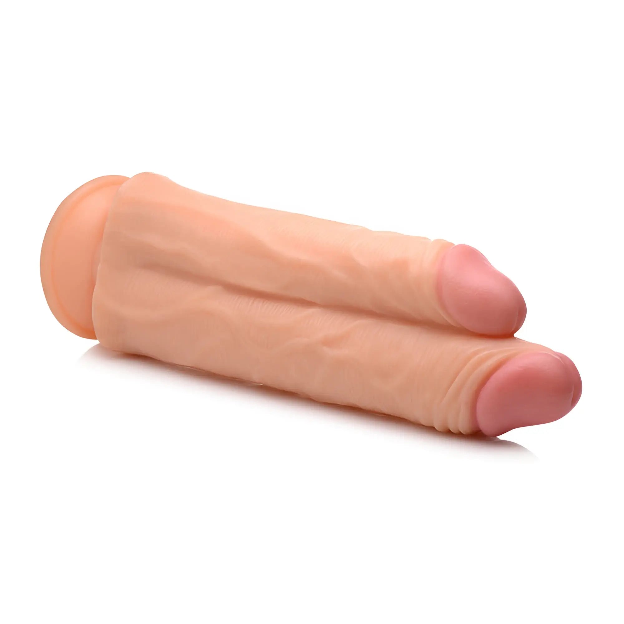 Master Cock Double Stuffer 10-inch dildo in a realistic tan color with two phallic tips and a circular base.