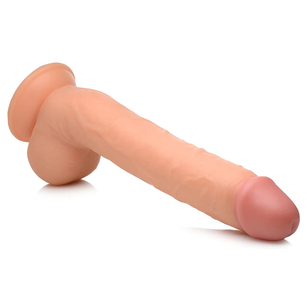 Master Cock Long Logan 10-inch flesh-toned realistic dildo with textured base and balls, isolated on white background.