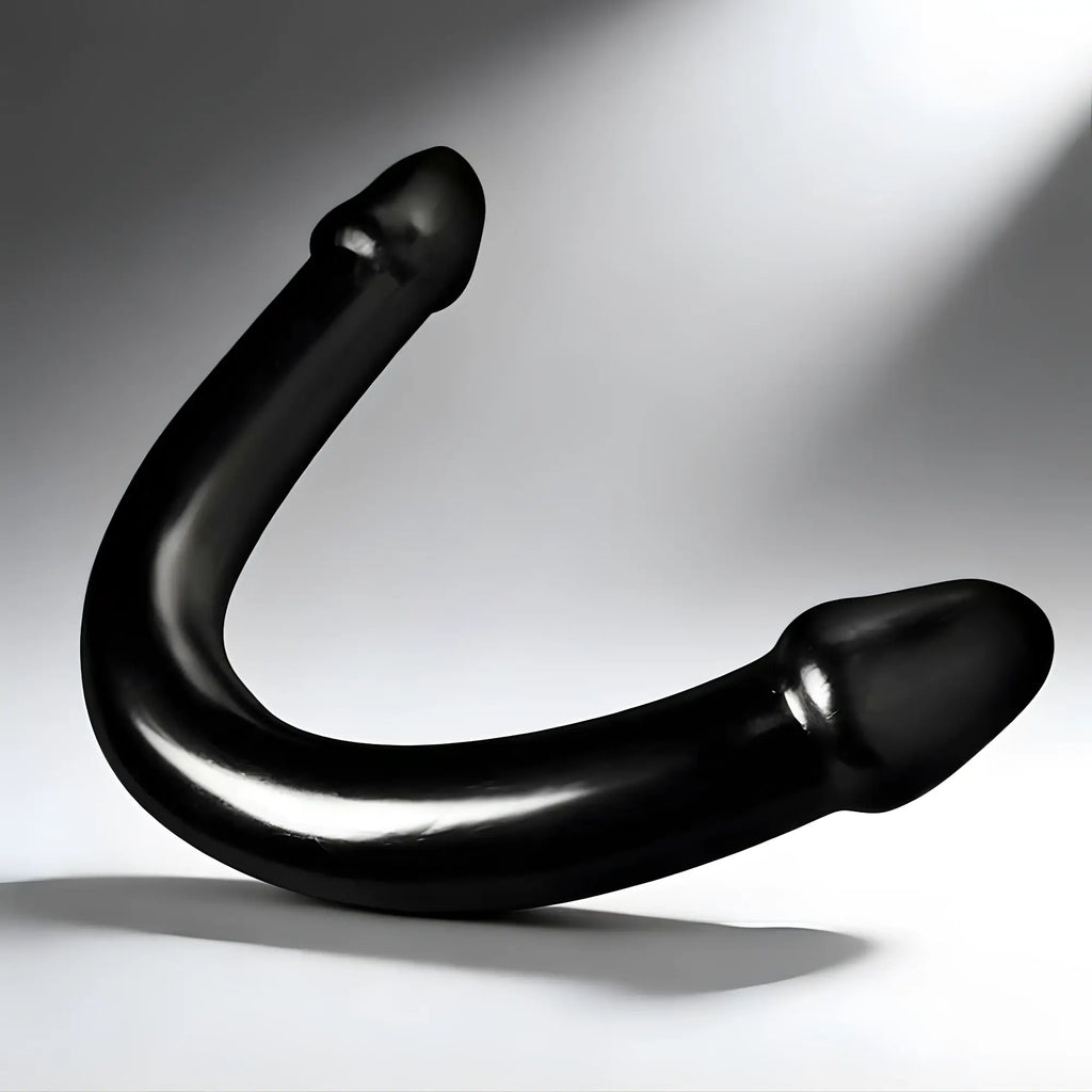 Master Cock The Python XL: A smooth, black, U-shaped double-ended toy against a white background.