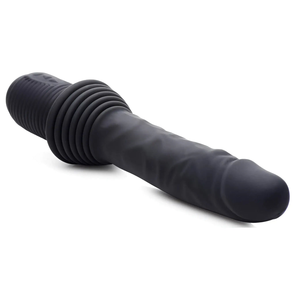 Master Series 10X black silicone dildo with a textured, realistic shaft and a wide, ribbed base against a white background.