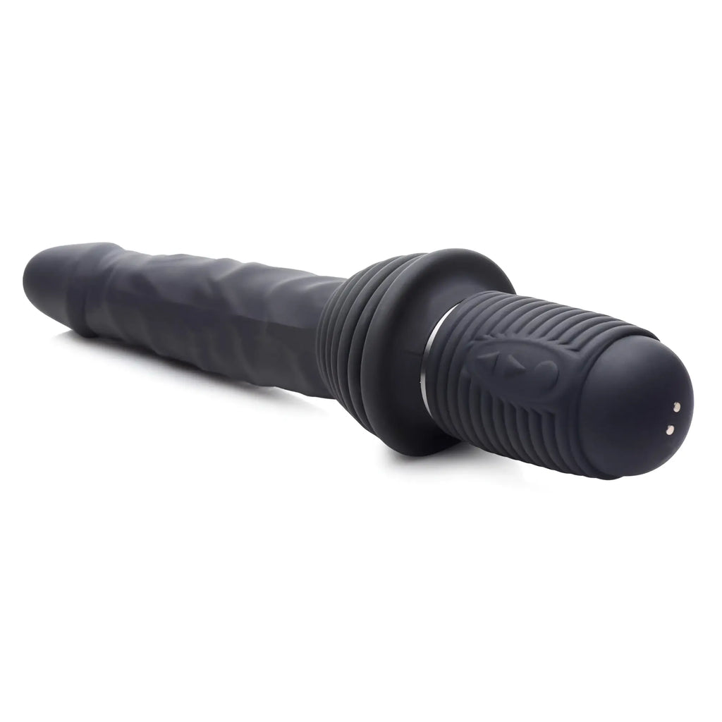 Master Series 10X black silicone vibrating, thrusting dildo with a textured, phallic-shaped shaft and ribbed base.