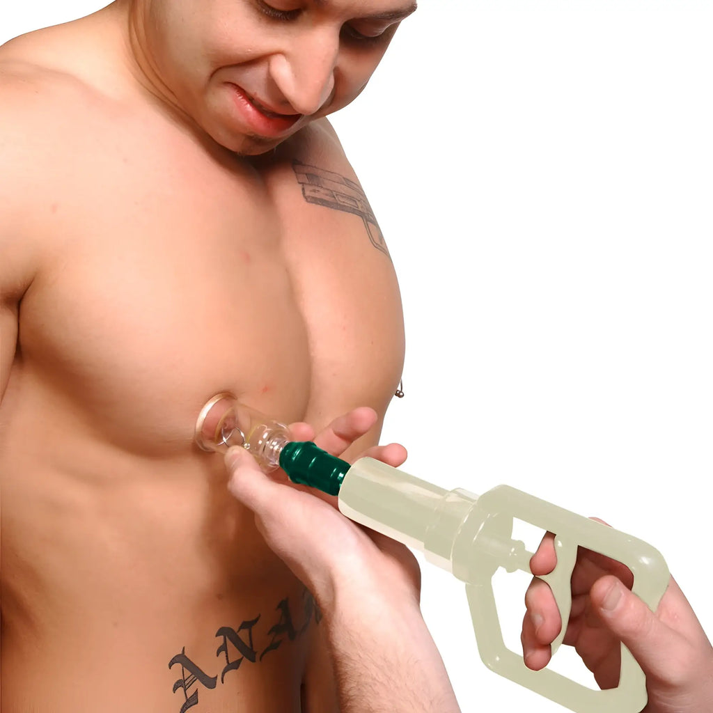 Master Series 12pc Cupping Kit: A man uses a clear suction pump tool with a green tip on his chest.
