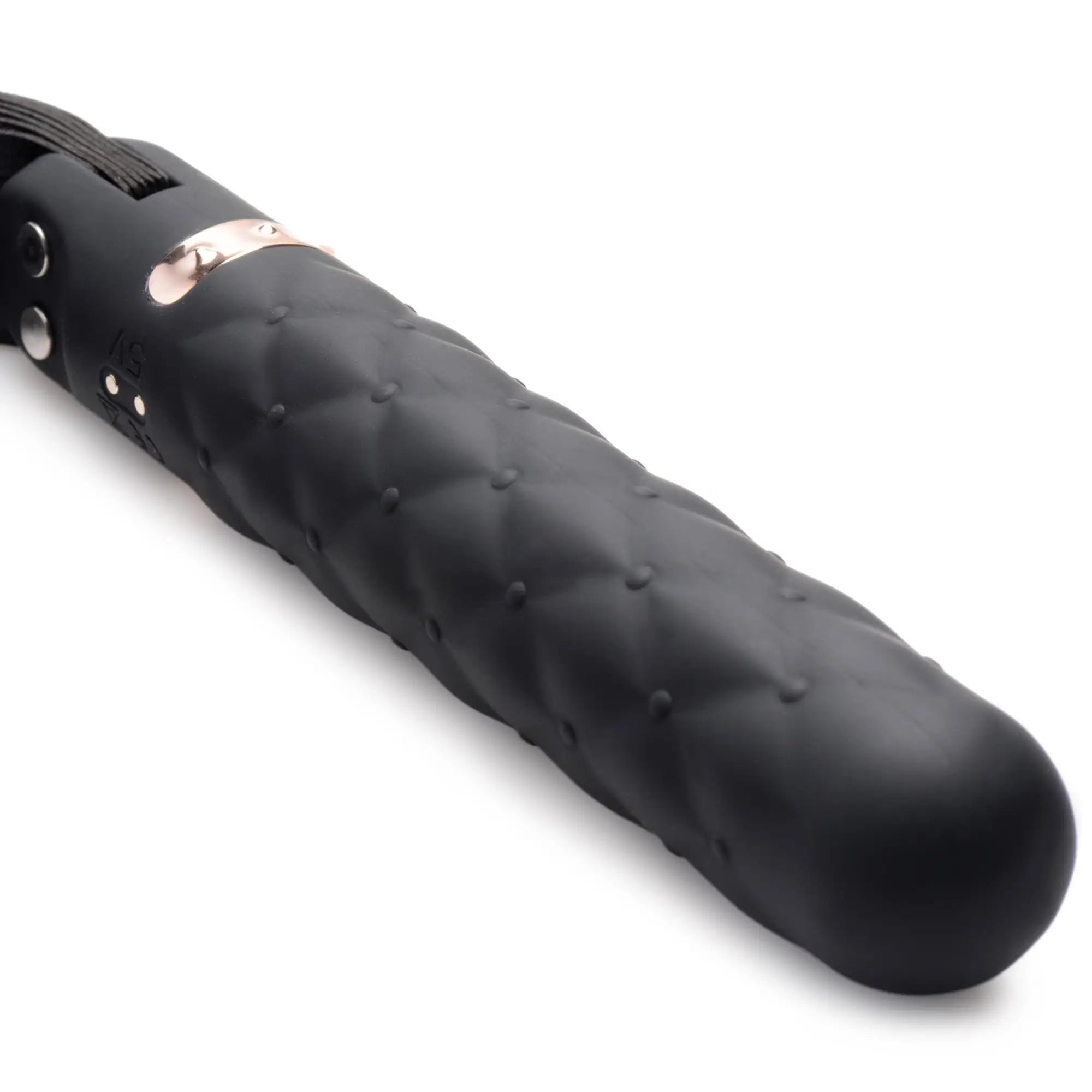 Master Series 9X black silicone vibrating dildo with a textured, quilted handle and metallic rose gold accent.