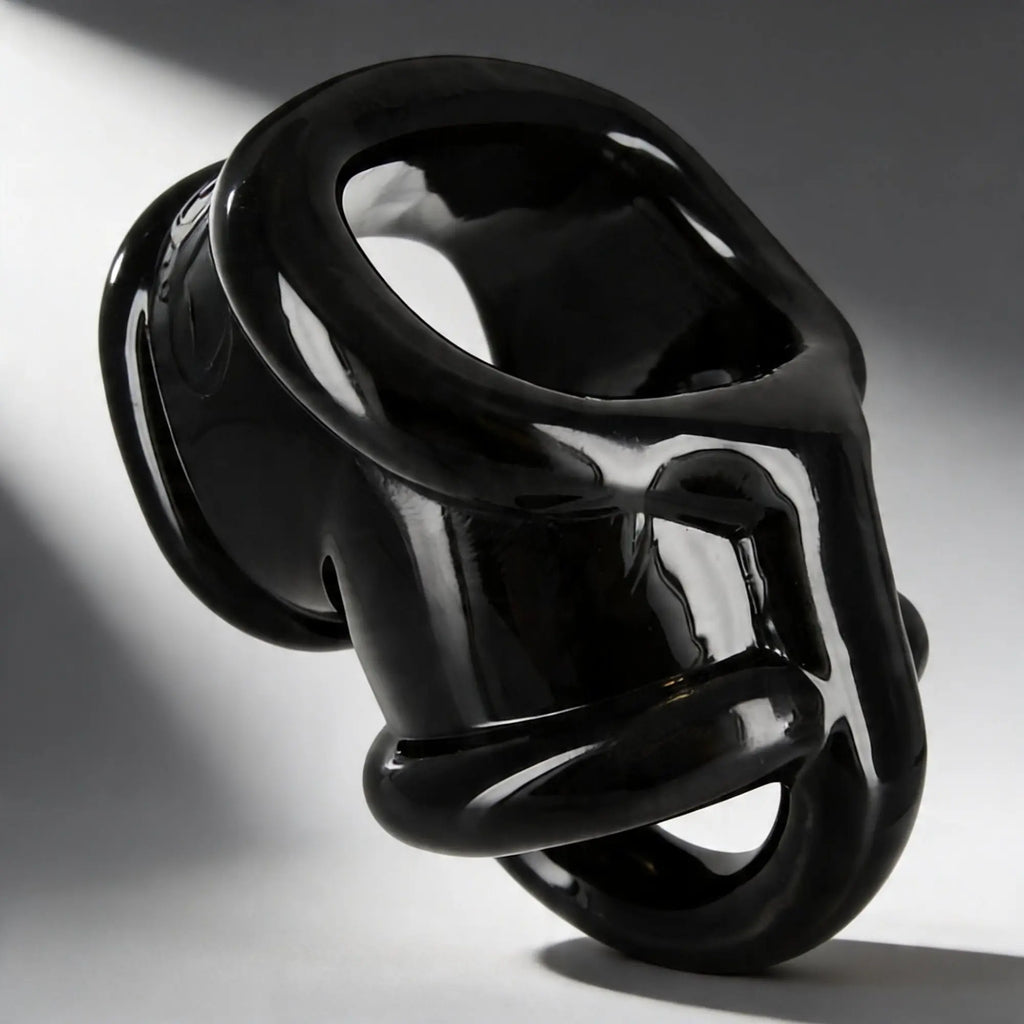 Master Series Annex Erection Enhancer: a glossy, black, sculptural silicone ring with a modern, ergonomic design.