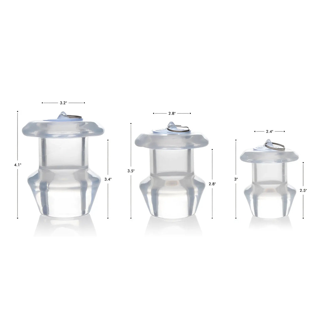 Three clear, hollow silicone Master Series anal dilator plugs of varying sizes with dimension labels.