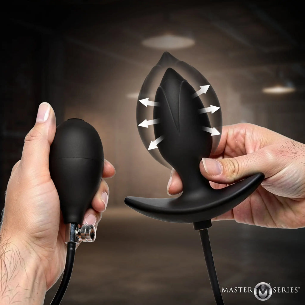 Master Series Ass Expander: A black, inflatable silicone anal plug with hand pump, shown expanding with directional arrows.