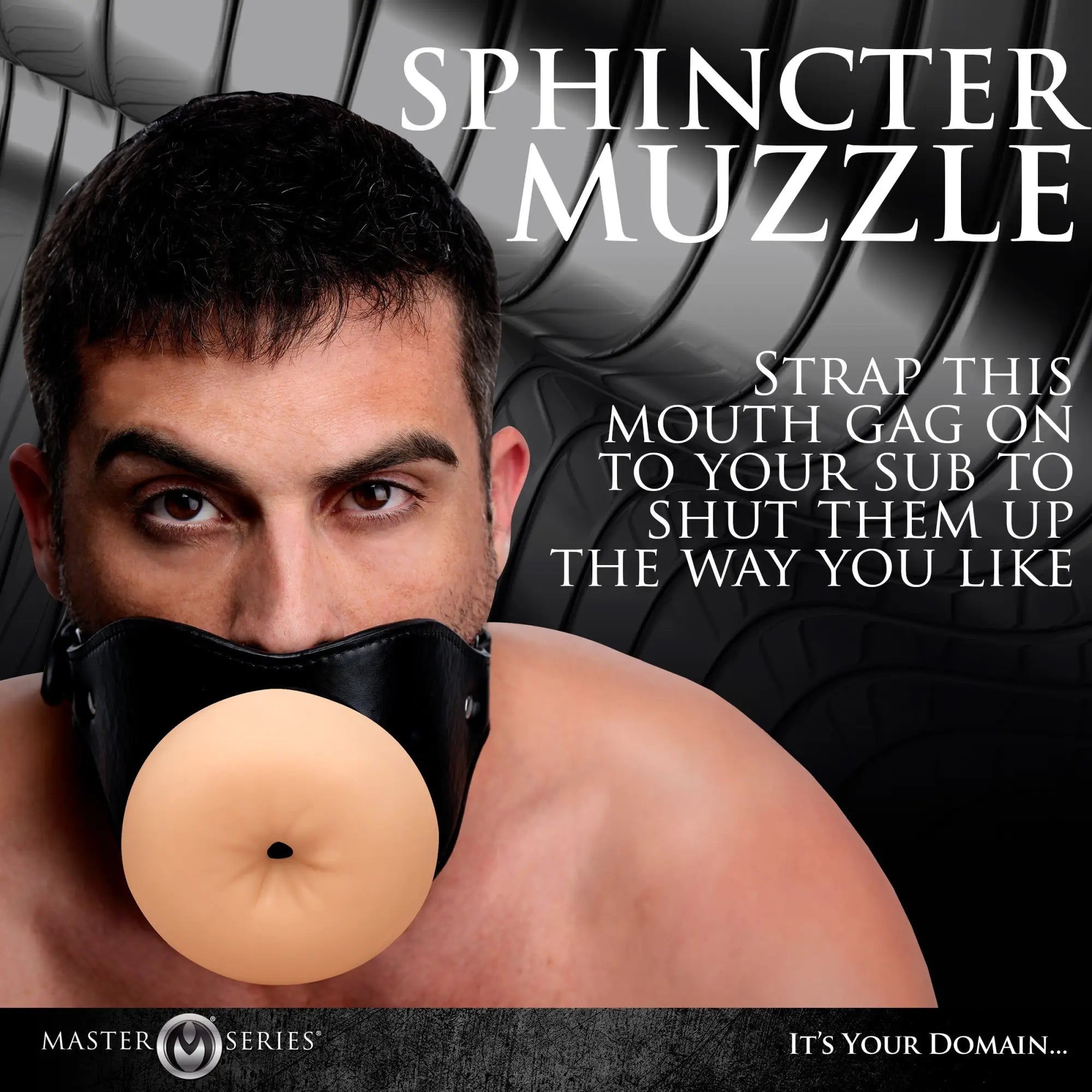 Master Series Ass Face Mouth Gag: A man wearing a black leather harness featuring a realistic, flesh-toned sphincter gag.