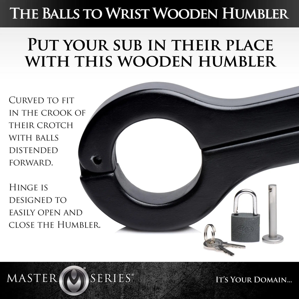 Master Series Balls to Wrist Humbler: A black, hinged wooden restraint device with an included padlock and metal pin.