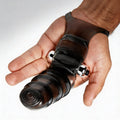 Master Series Bang Bang P-Spot Vibrating Finger Glove: A translucent black silicone finger attachment on a palm base.