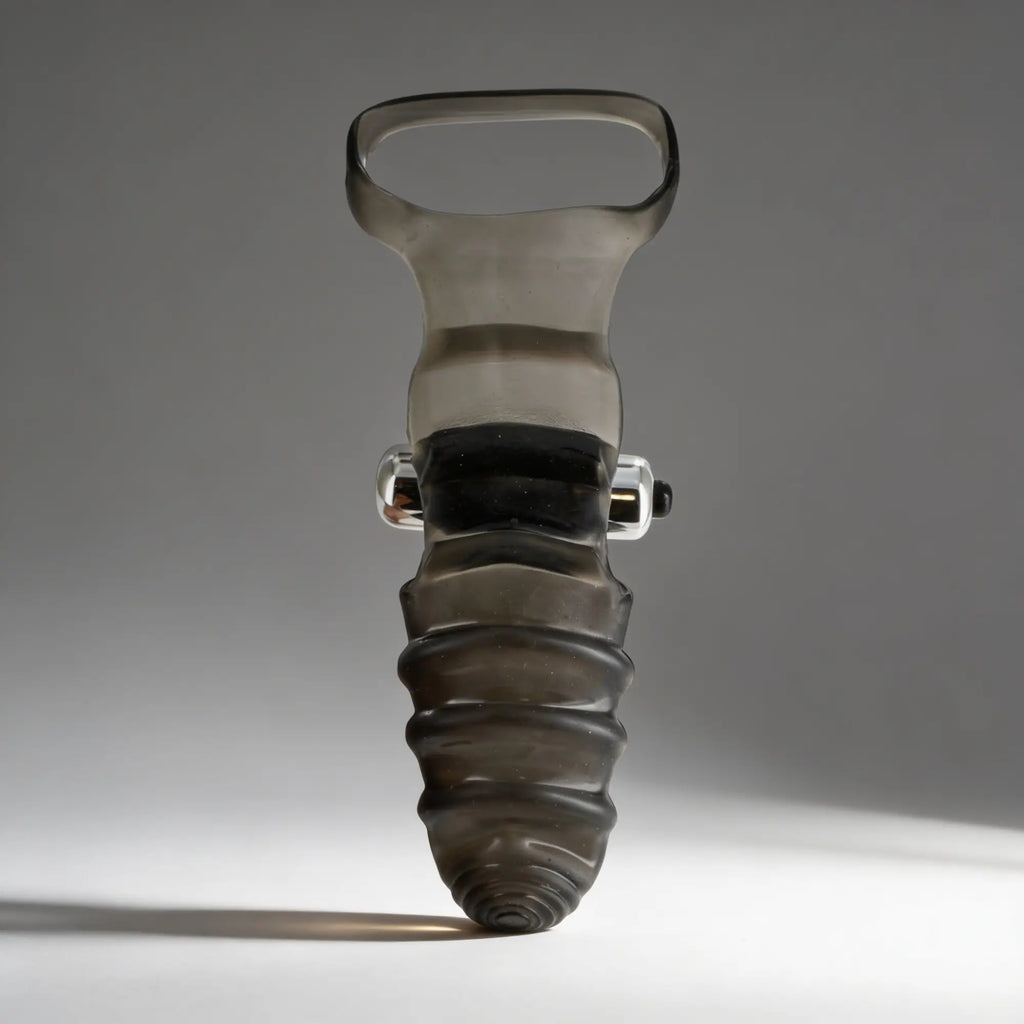 Master Series Bang Bang vibrating finger glove in translucent smoke-grey silicone with a ribbed, tapered design.