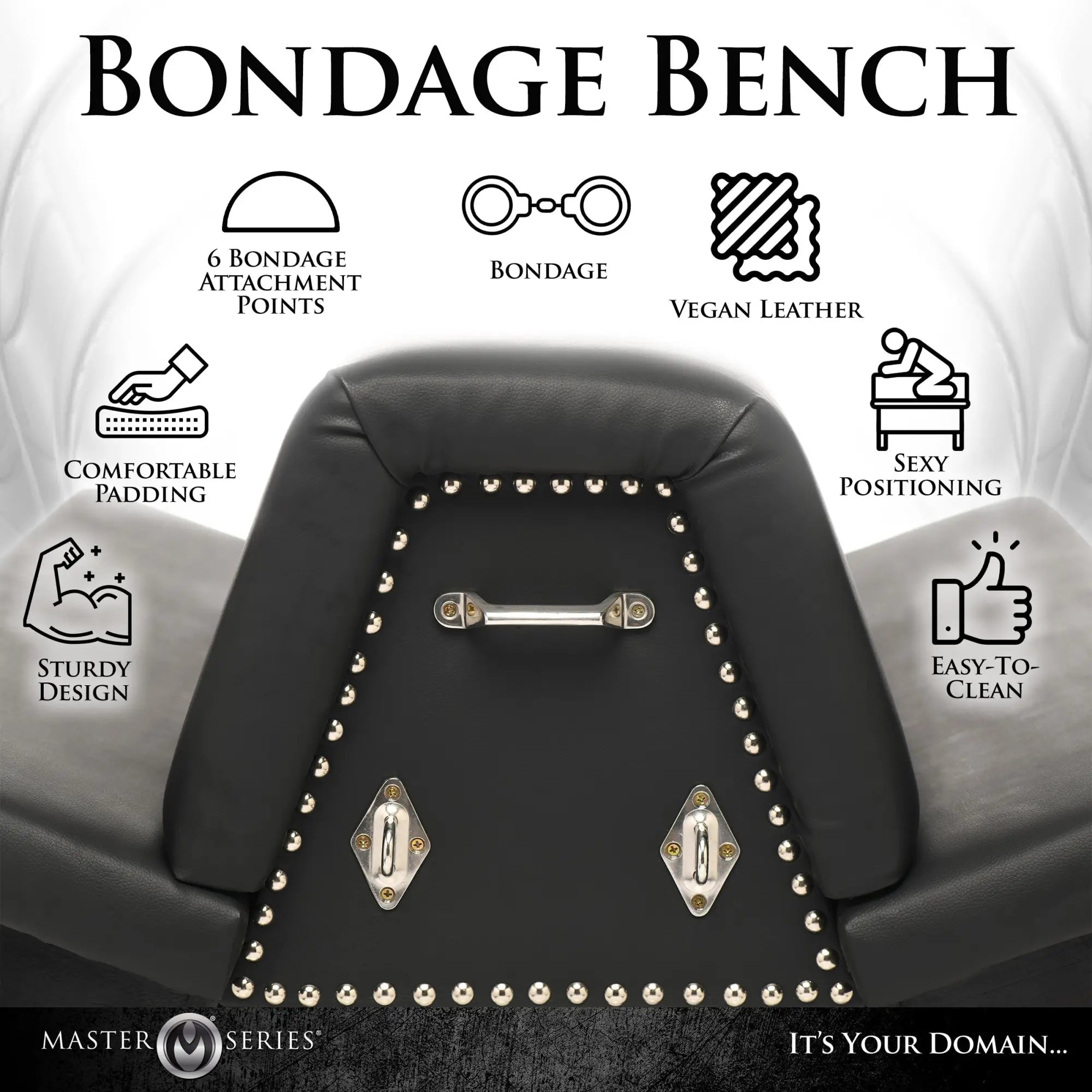 Master Series Bareback Submission Horse: Black padded bench with silver stud accents, metal handle, and D-ring mounts.