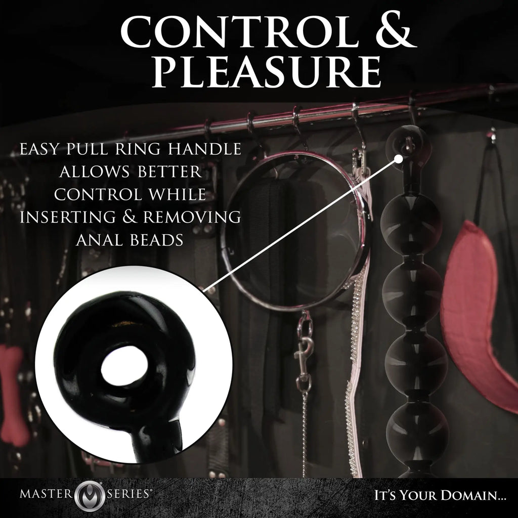 Master Series The Black Baller Anal Beads: A set of glossy black beads with a circular pull ring handle for control.