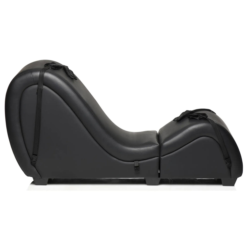 Master Series black leather detachable sex chaise with two love pillows and restraint straps on a white background.
