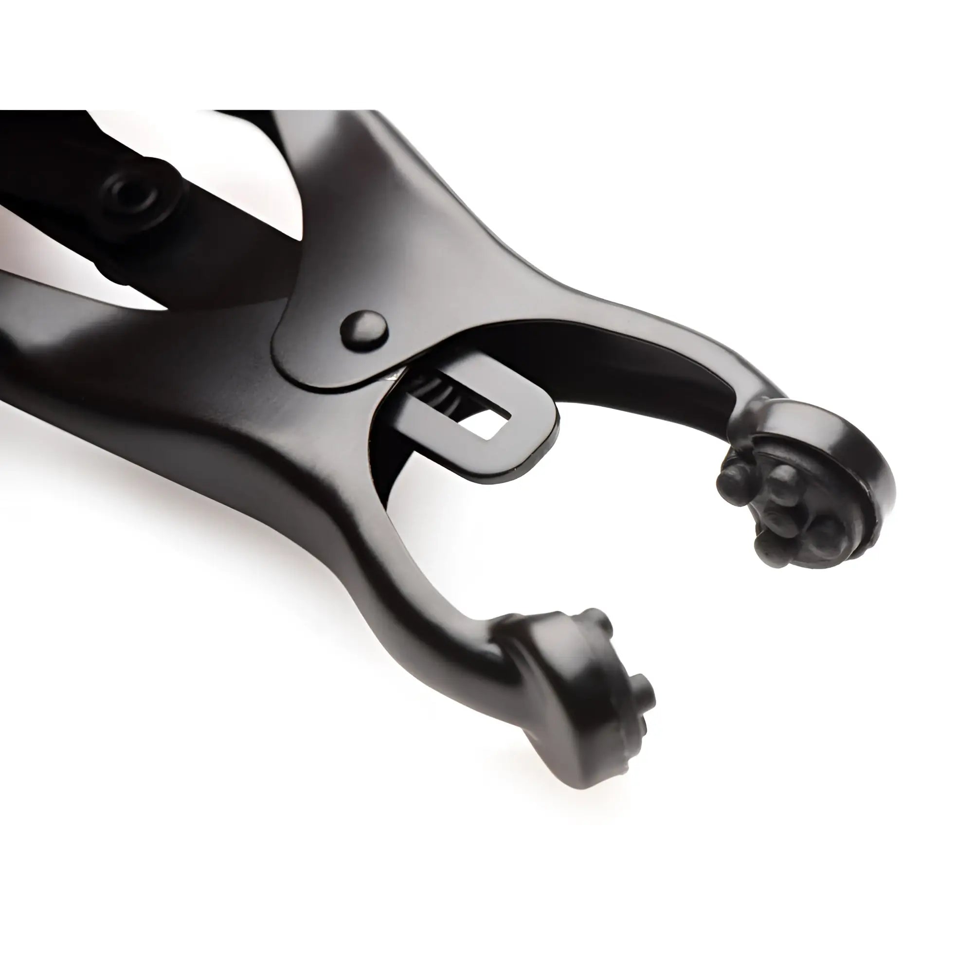 Master Series Japanese nipple clamps in matte black, featuring a spring-loaded metal design with textured tips.
