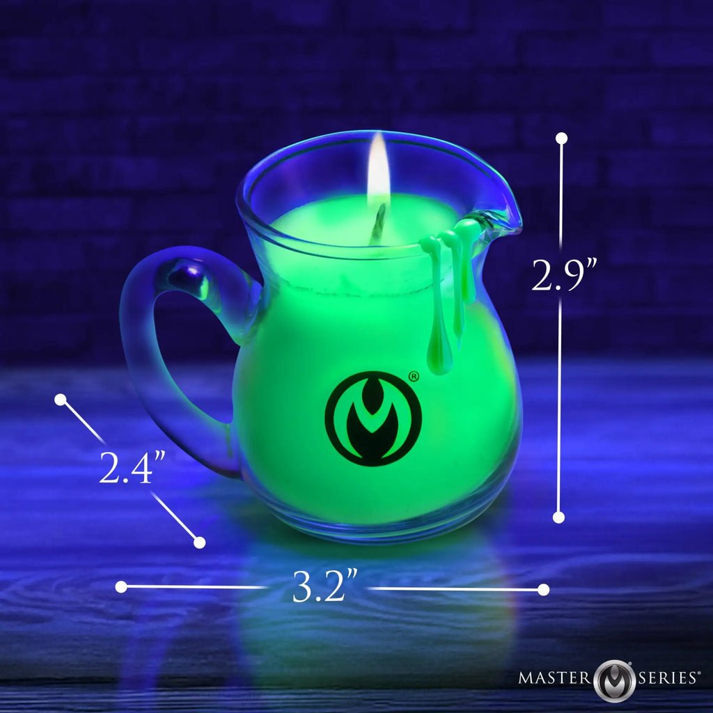 Master Series Blacklight Wax Play Pitcher: A glass pitcher with glowing green wax and dimensions marked in inches.