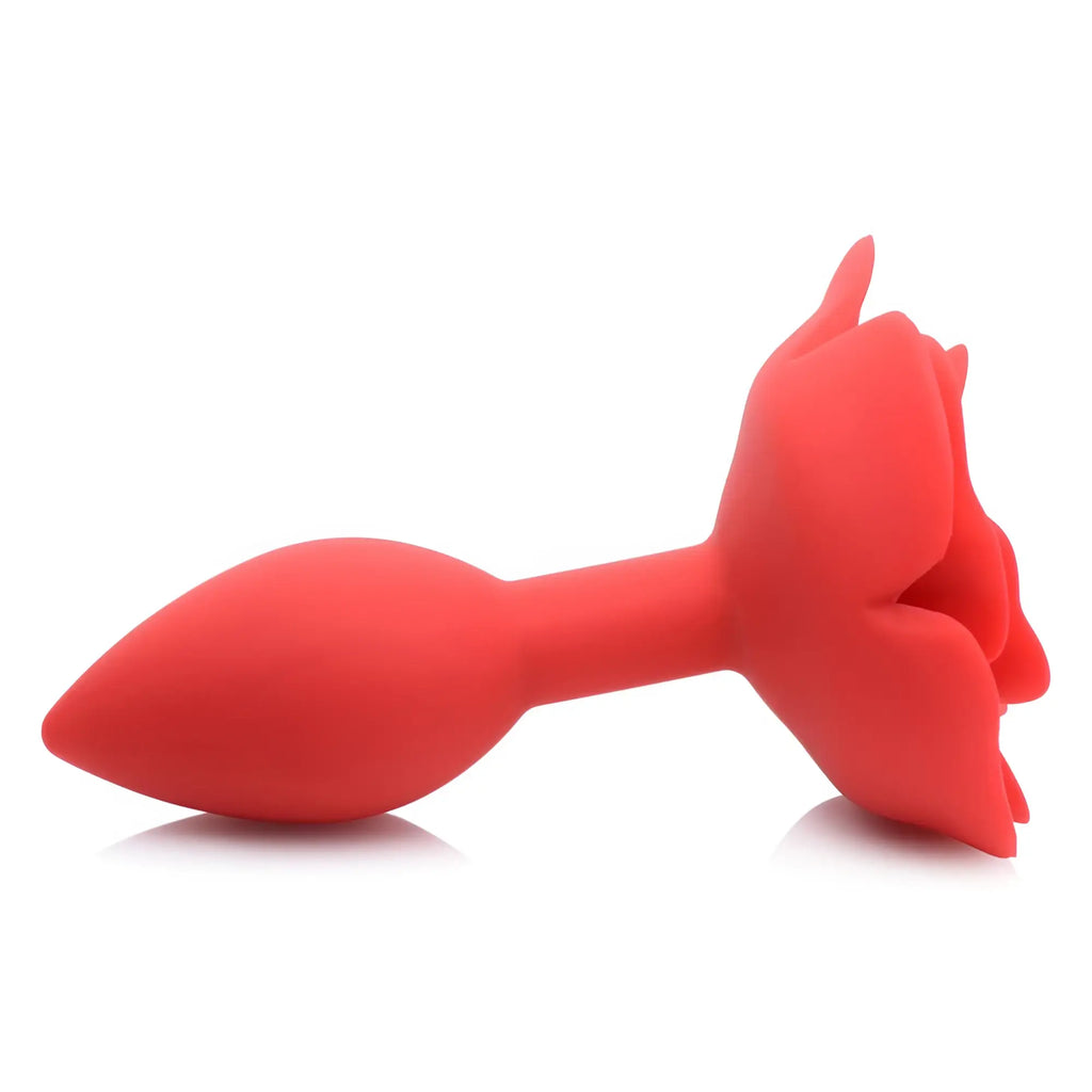 Master Series Booty Bloom silicone anal plug in bright red, featuring a tapered shaft and a decorative rose-shaped base.