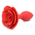 Master Series Booty Bloom: A vibrant red, rose-shaped silicone anal plug on a white background.