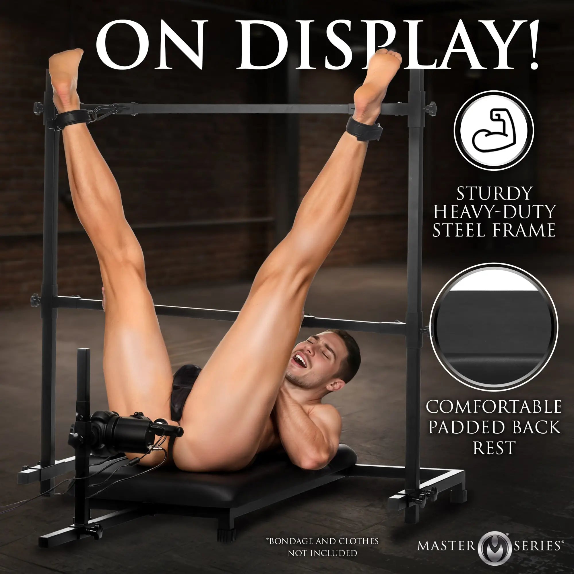 Master Series Breed Master breeding stand with black steel frame, padded seat, ankle cuffs, and integrated sex machine.