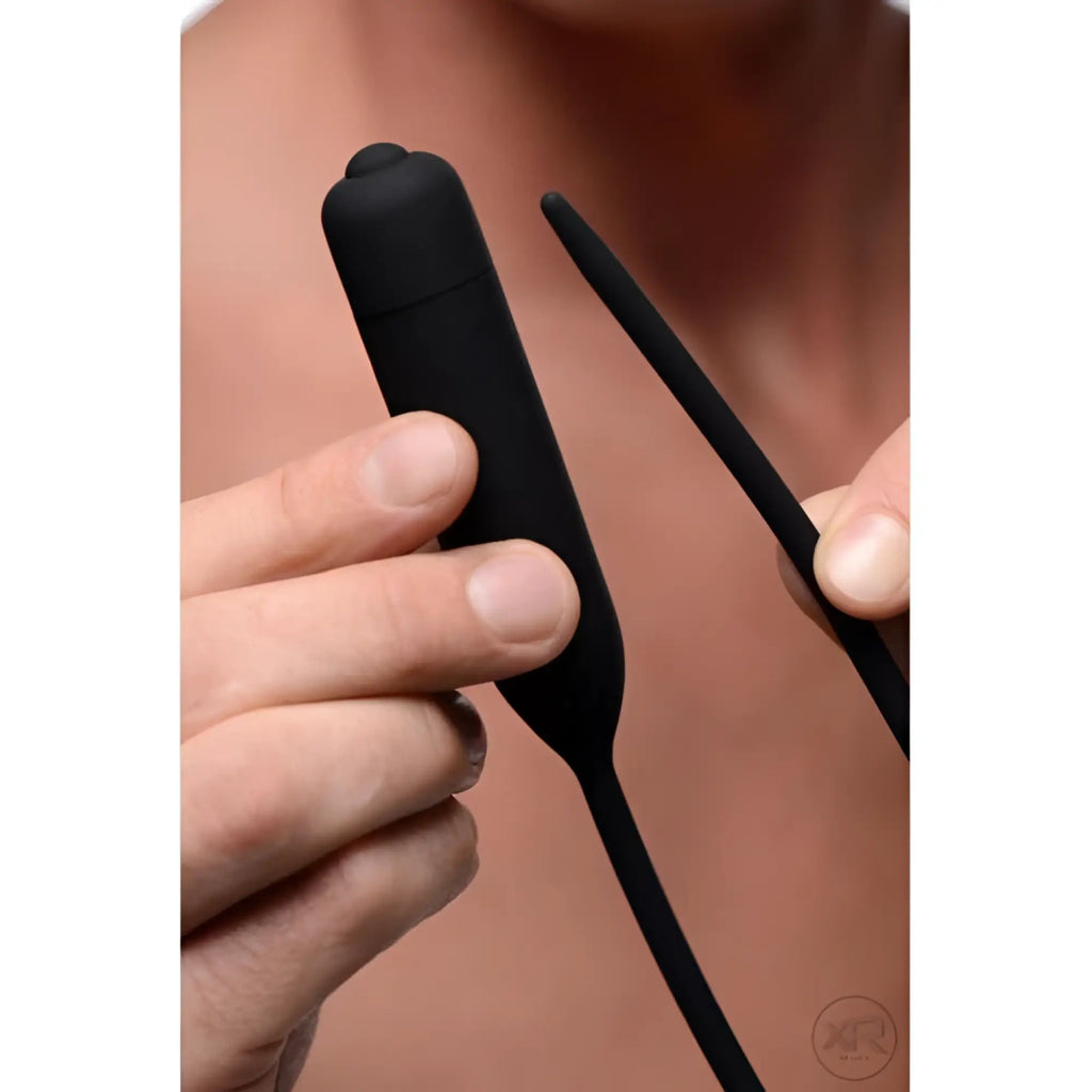 Master Series Cadence Extreme vibrating urethral sound: a smooth, matte black, dual-part silicone device.