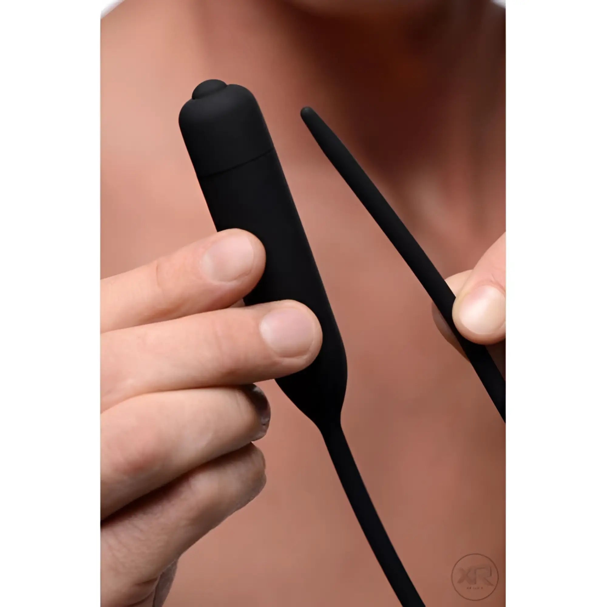 Master Series Cadence Extreme vibrating urethral sound: a smooth, matte black, dual-part silicone device.