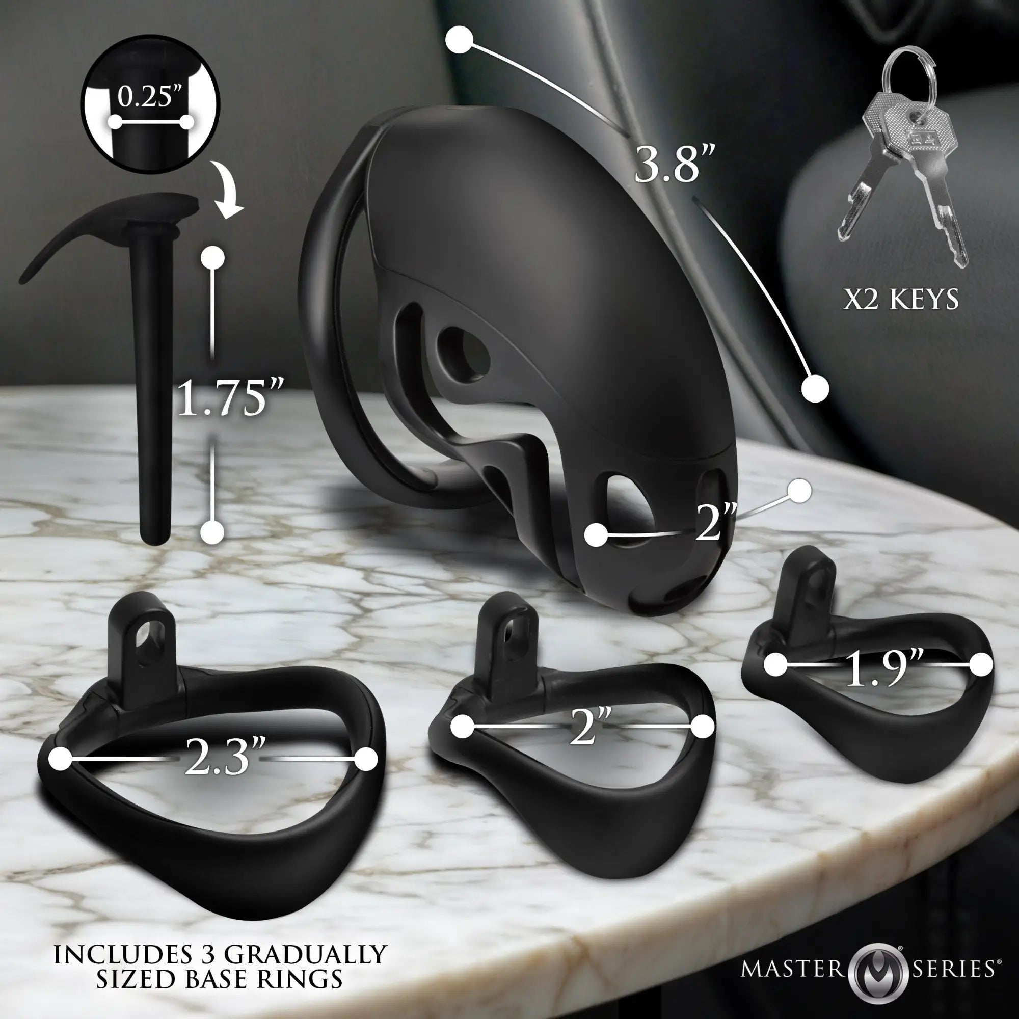 Black Master Series Captor chastity cage with three base rings, a locking pin, and two keys, showing various dimensions.