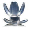 Master Series Clawed Expanding Clear Dilator: a transparent, petal-shaped expanding device on a curved base.