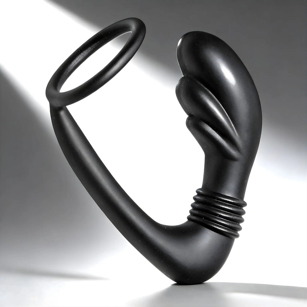 Master Series Cobra: black silicone prostate massager and cock ring with a curved, ribbed design.