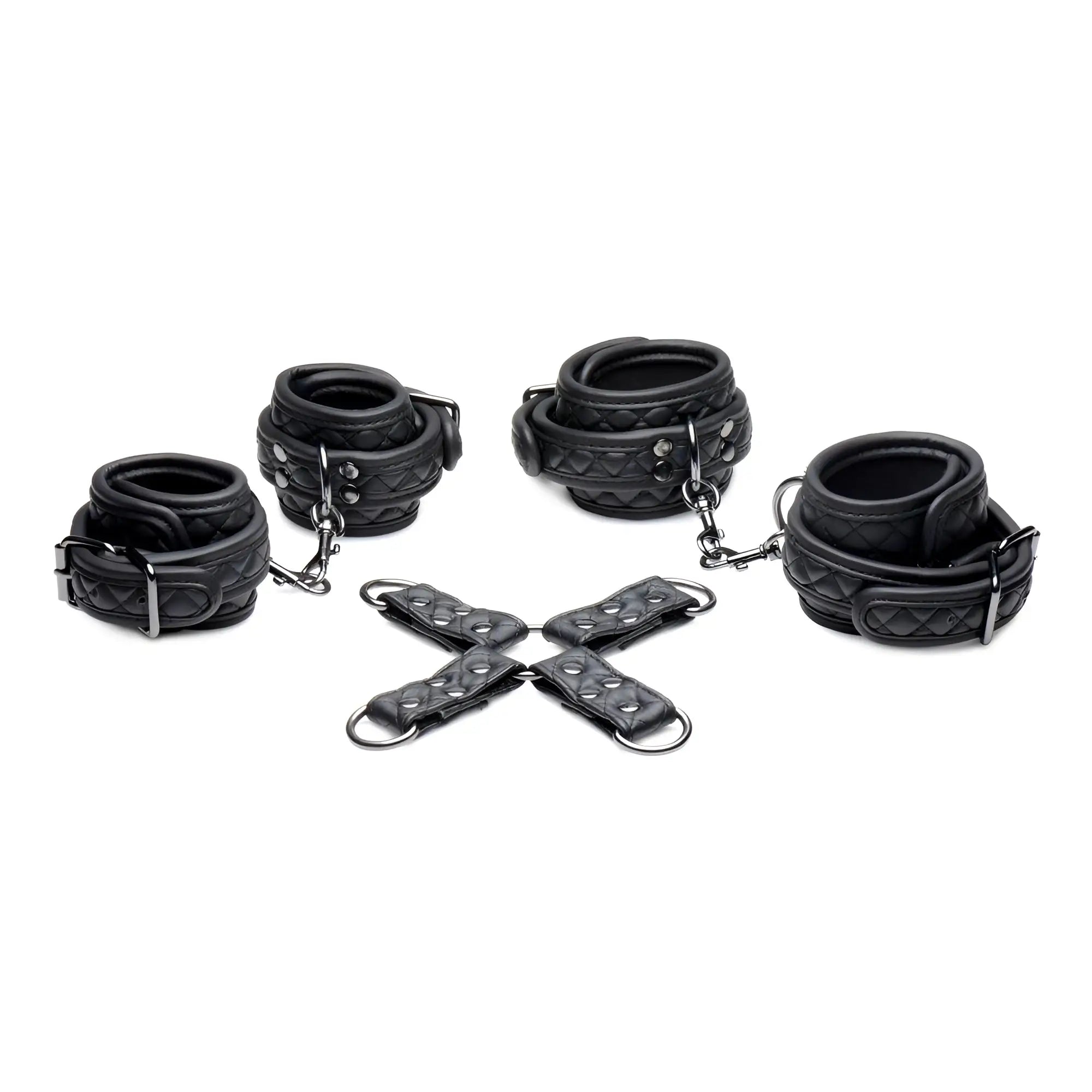 Master Series Concede black quilted leather wrist and ankle restraints with a central metal hog-tie connector.