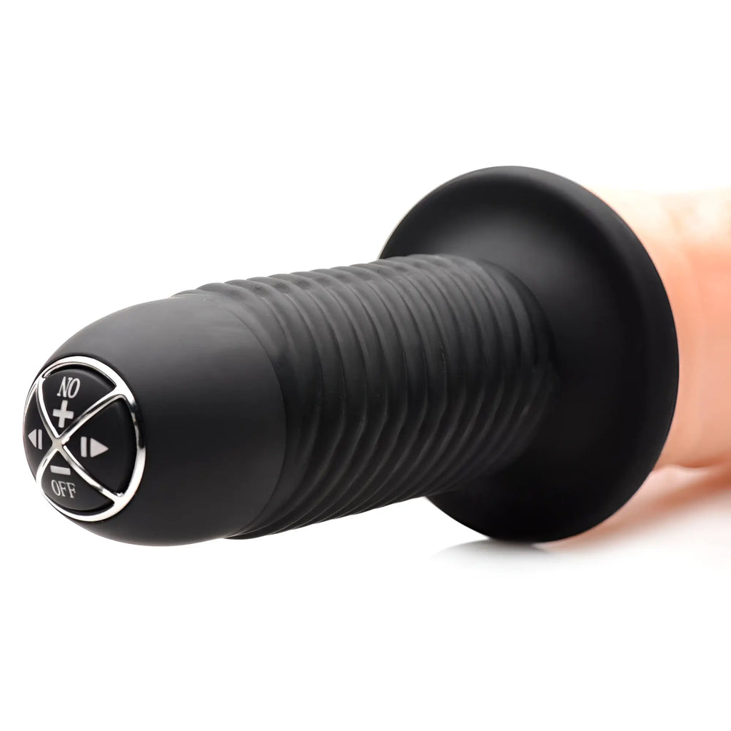 Master Series Curved Dicktator thruster: Close-up of black, ribbed handle with chrome navigation buttons on the base.