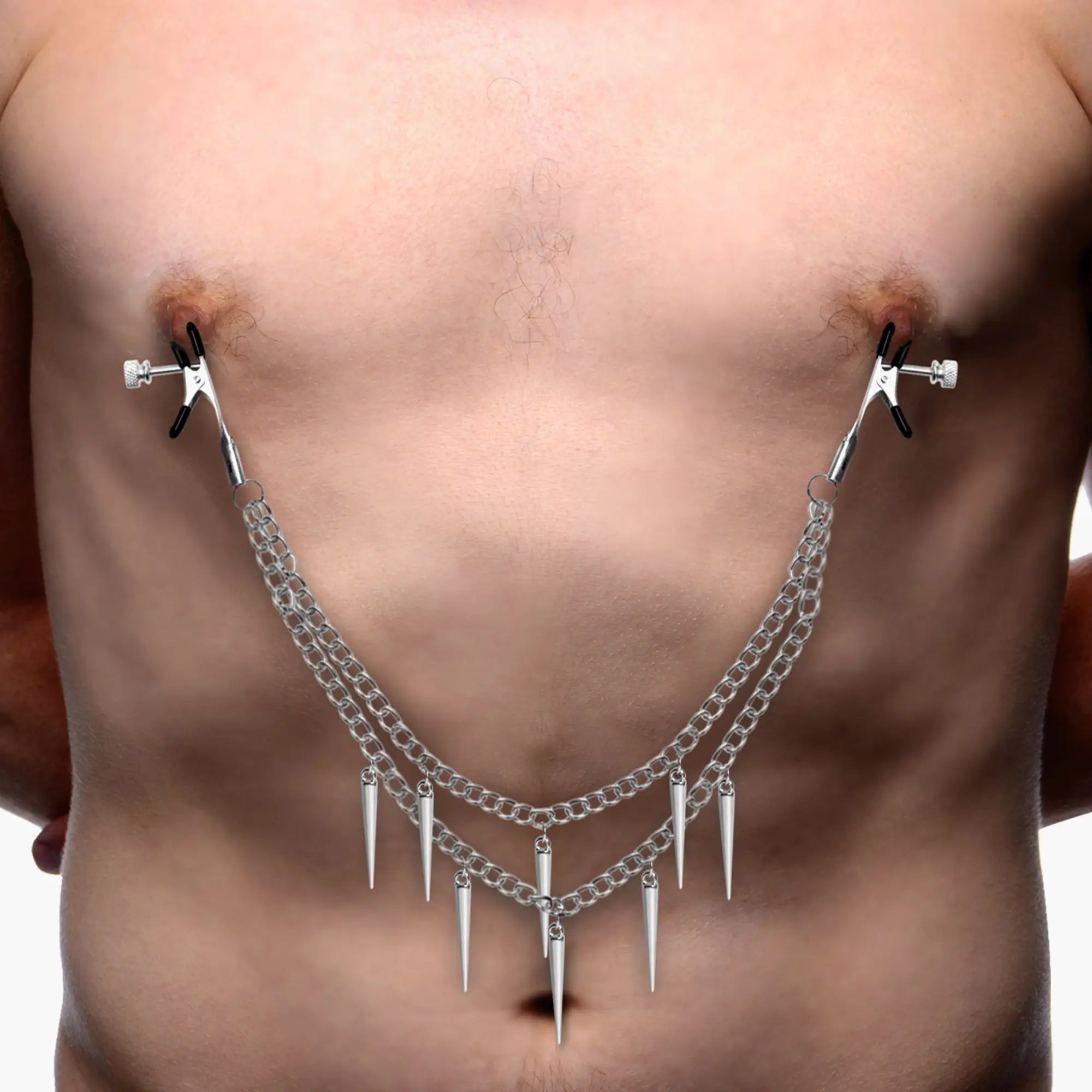 Master Series Daggers: Silver-tone nipple clamps with two connecting chains and dangling spike charms on a person.
