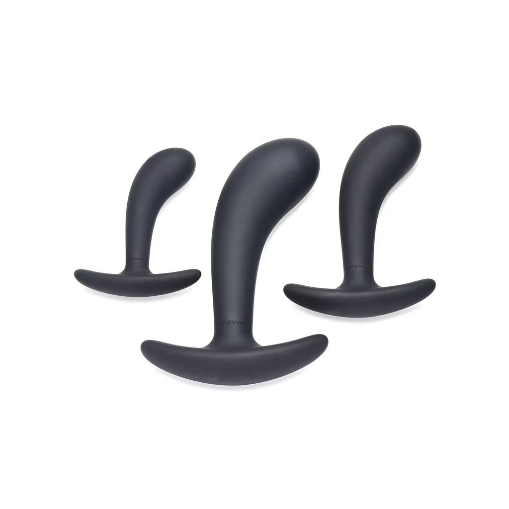 Master Series 3-piece dark grey silicone anal trainer set with curved, smooth designs and flared bases.