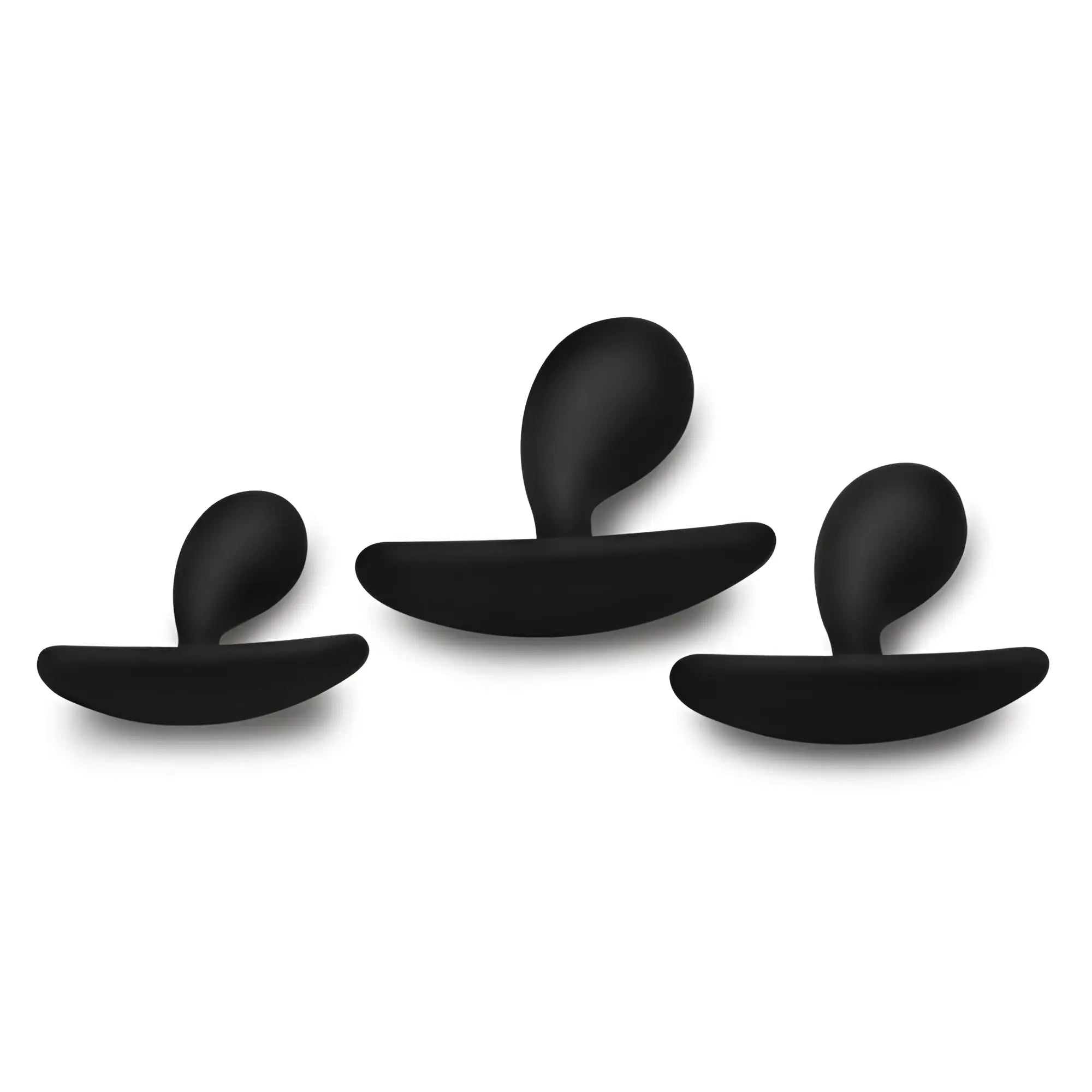 Master Series Dark Droplets: three matte black, curved, silicone anal trainers in varying sizes against a white background.