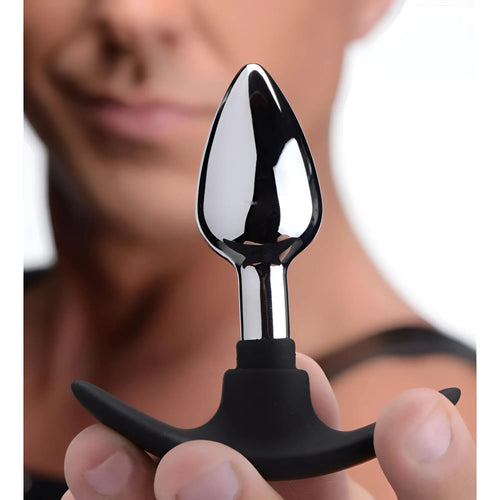 Master Series Dark Invader anal plug with a polished silver metal tip and black silicone T-shaped handle.