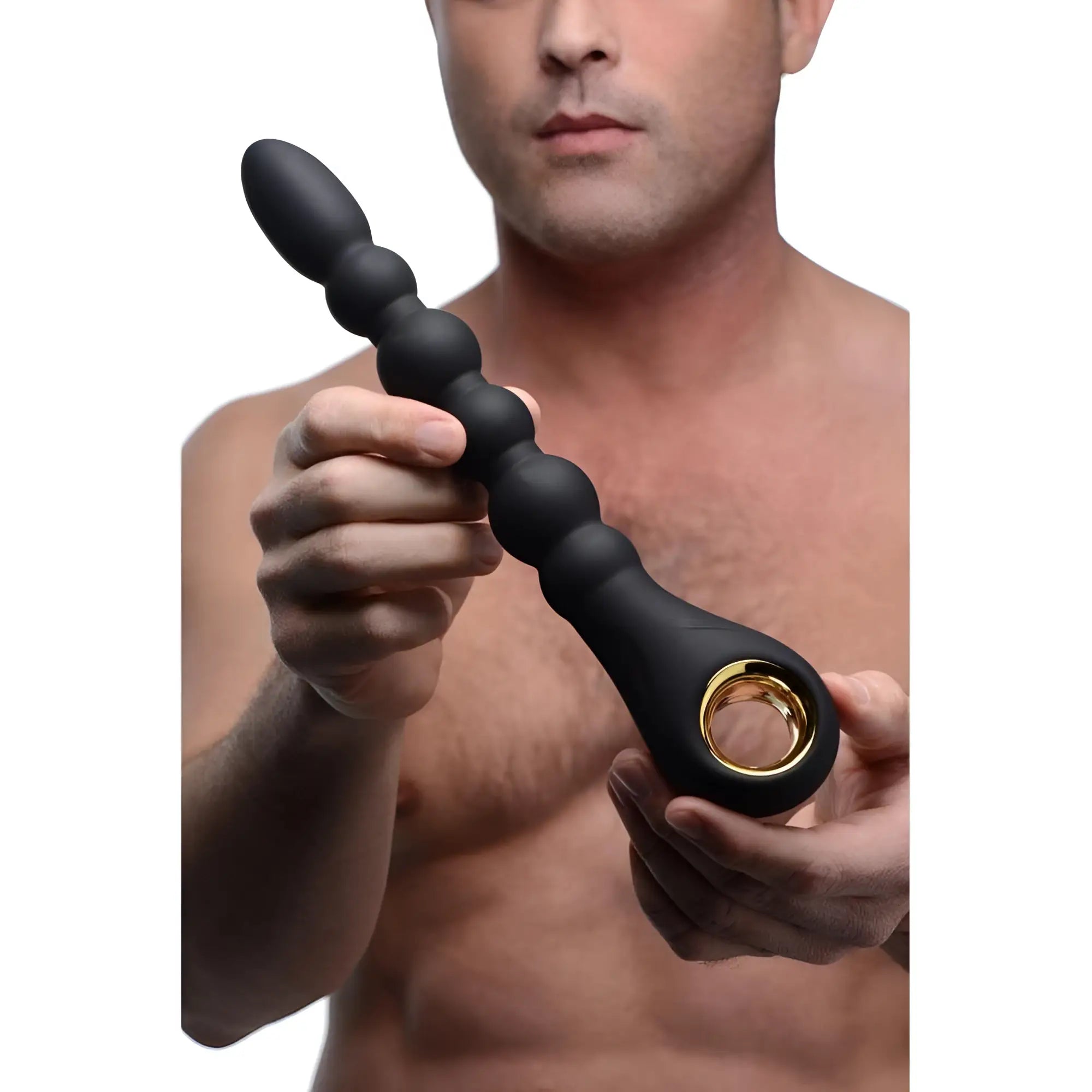 A man holding the matte black, 10-bead Master Series Dark Scepter with a gold-accented ring base.