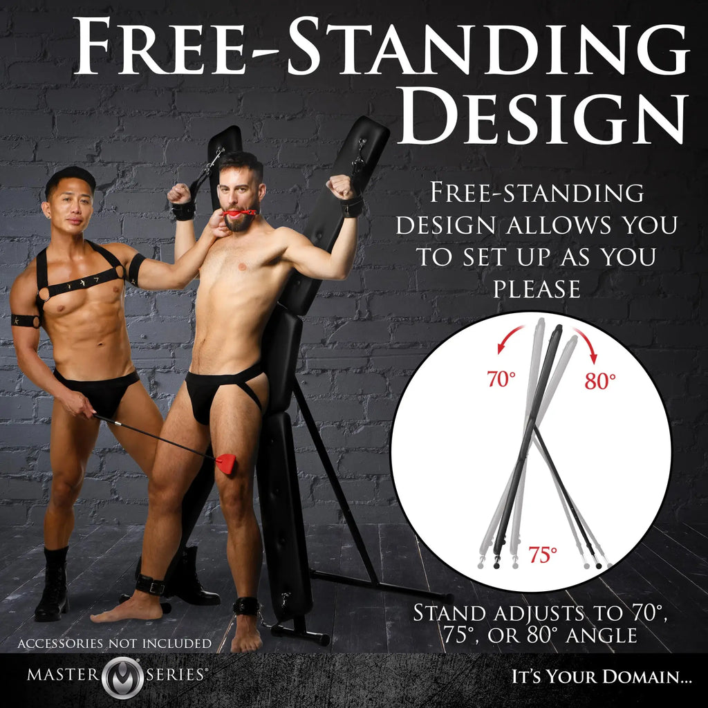 Master Series Deluxe St. Andrew's Cross: A black, free-standing, adjustable angle restraint cross against a brick wall.