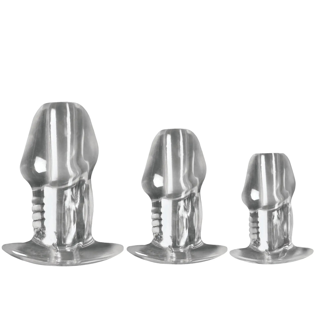 Master Series 3pc clear hollow anal plug set with realistic phallic shapes in graduated sizes on a white background.