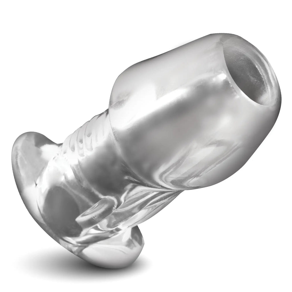 Master Series Clear Hollow Anal Plug: A translucent, phallic-shaped anal toy with a textured base and open tip.