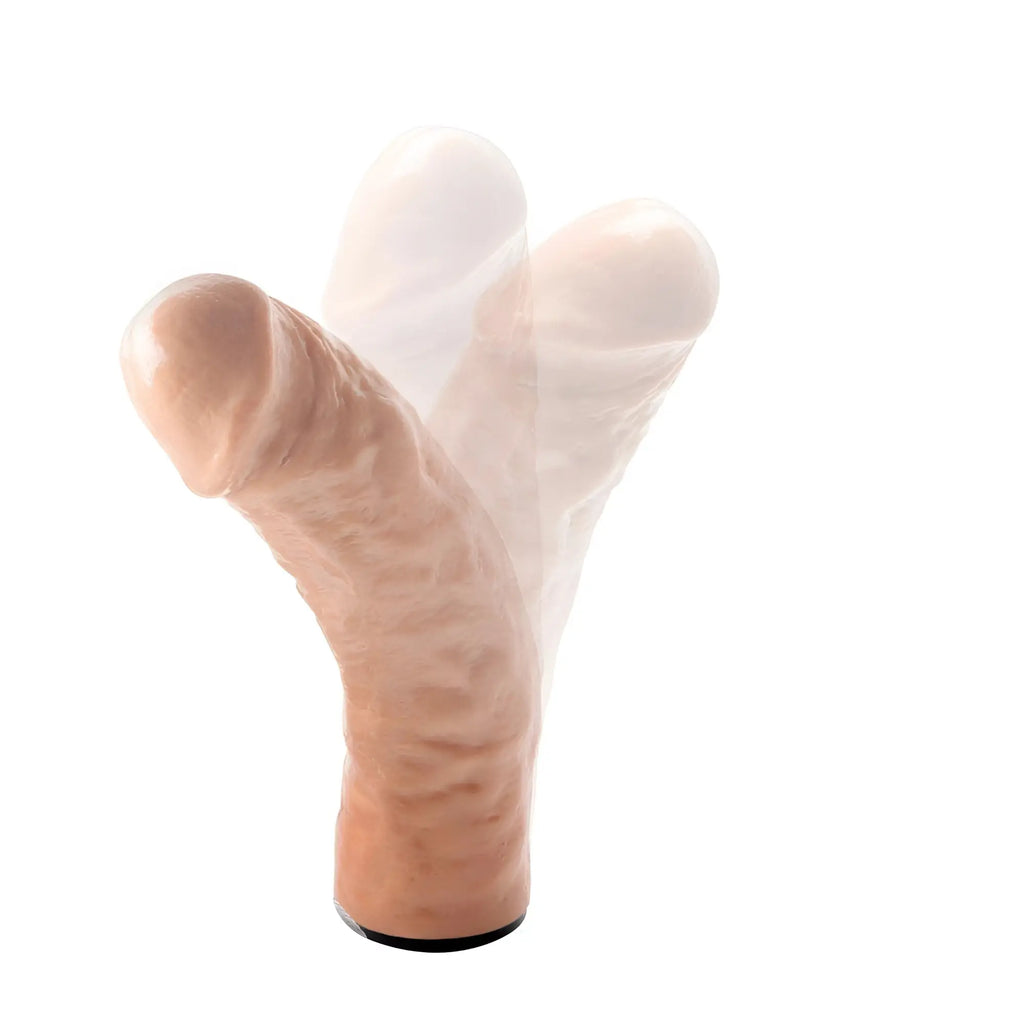 Master Series The Dicktator, a textured, flesh-toned phallic attachment showing motion blur on a white background.