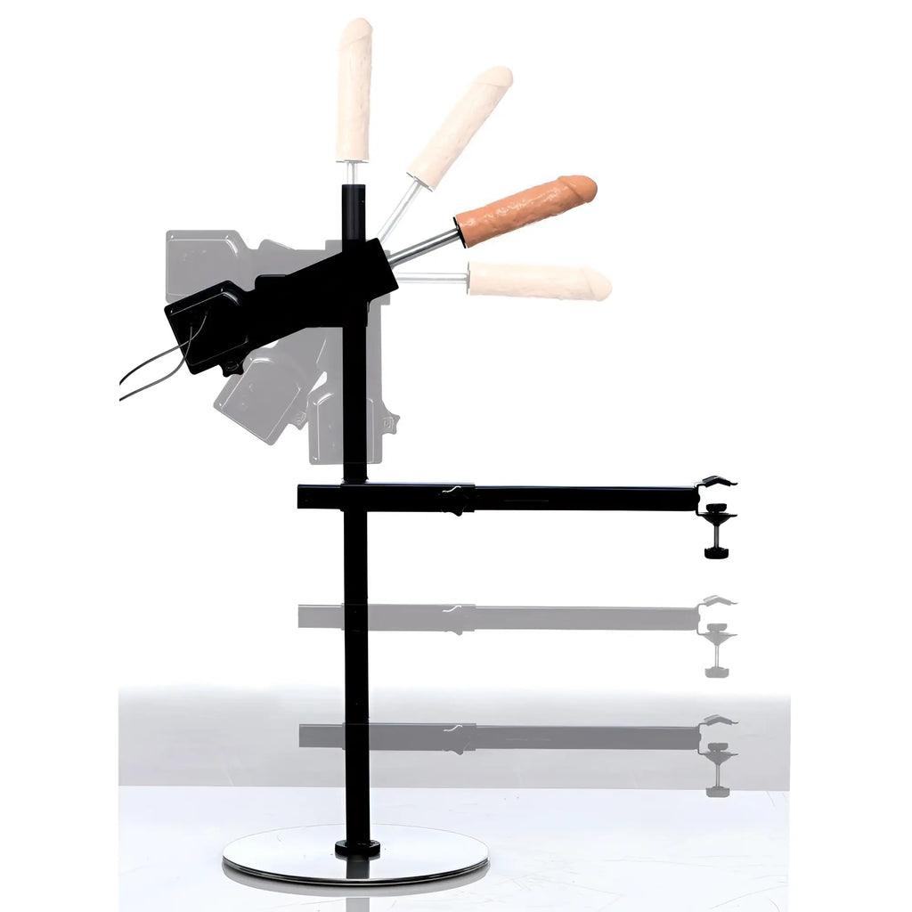 Master Series The Dicktator sex machine with black adjustable stand, metal base, and a tan phallic attachment.