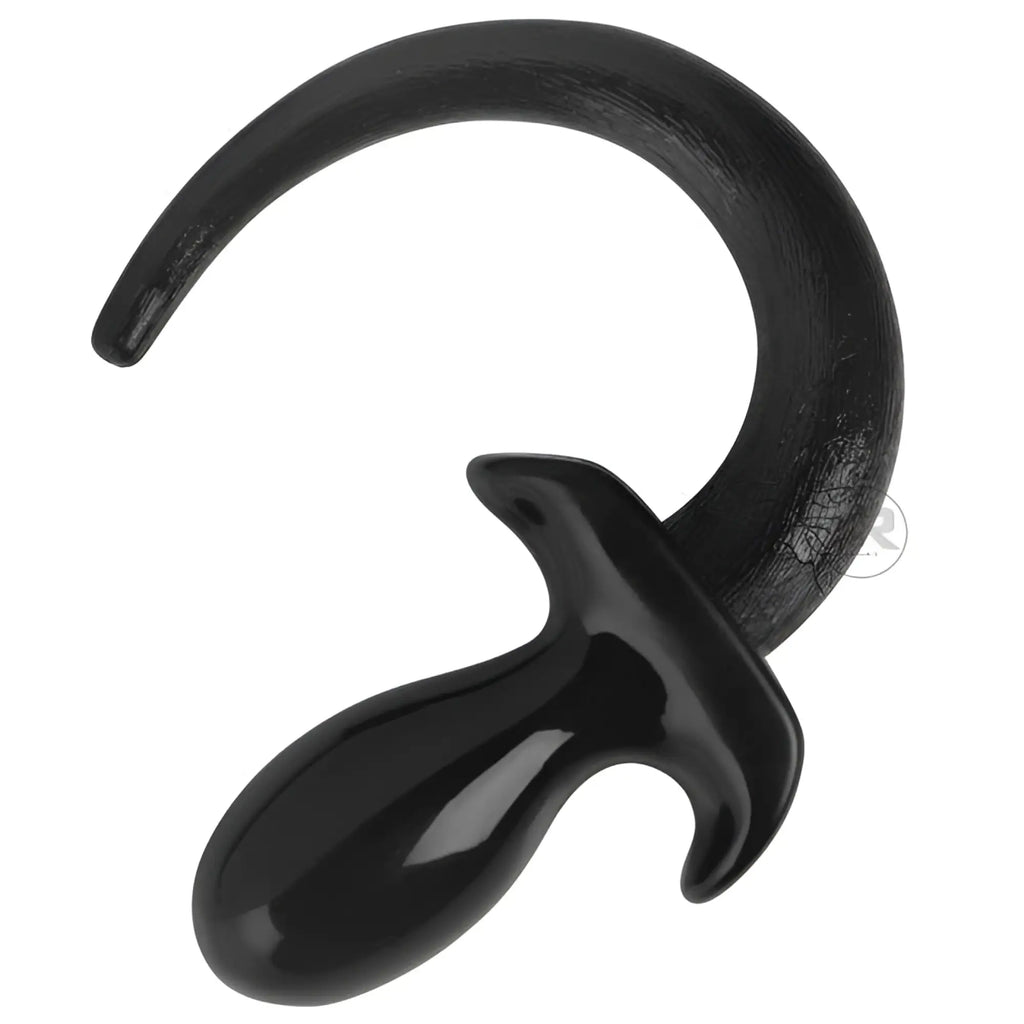 Master Series The Dog Tail butt plug with a smooth, black glossy base and a textured, curved black tail extension.