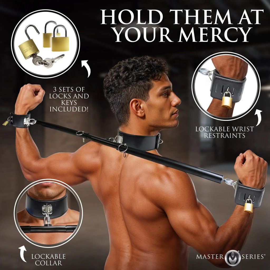 Master Series Dominion black leather spreader bar with a locking collar, wrist cuffs, and three brass padlocks with keys.