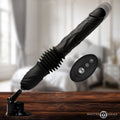 Master Series Double Pounder black silicone thruster dildo with bellows base, suction cup mount, and remote control.