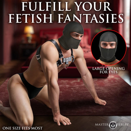 Master Series The Drone Hood: A man wears a black stretch fabric hood with an eye opening and a leather chest harness.
