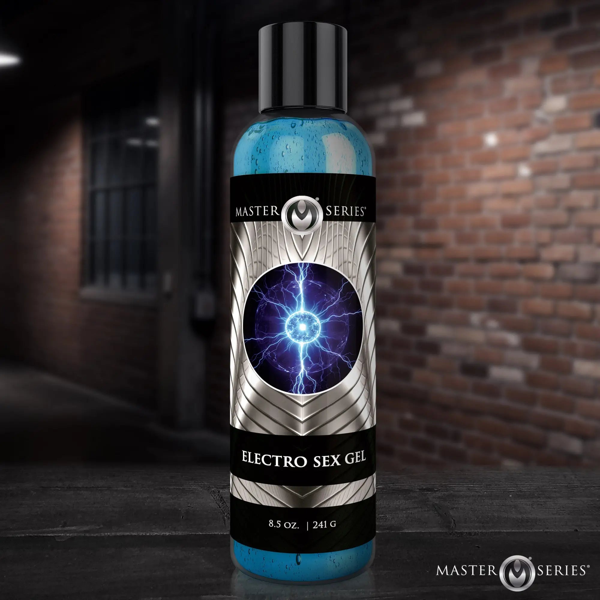 An 8.5 oz bottle of Master Series Electro Sex Gel, featuring a blue gel and a label with a metallic electric orb design.