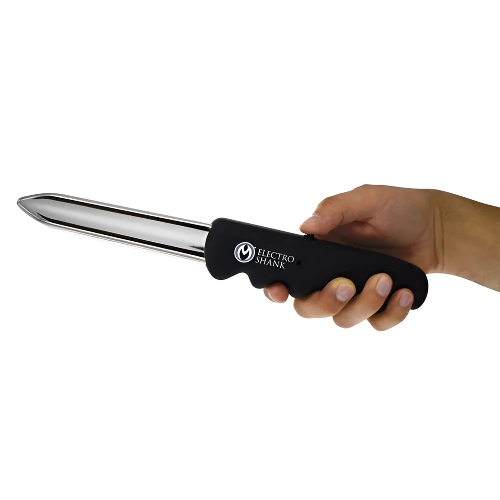 A hand holds a Master Series Electro Shank blade with a black, ergonomic handle and a silver, polished metal point.