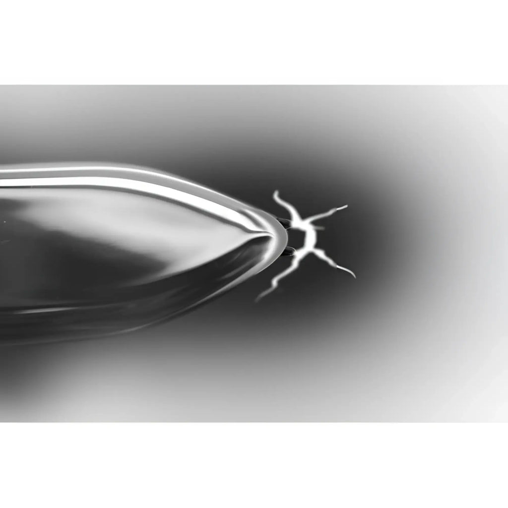 Master Series Electro Shank blade with a metallic finish, emitting a bright white electrical spark from its tip.